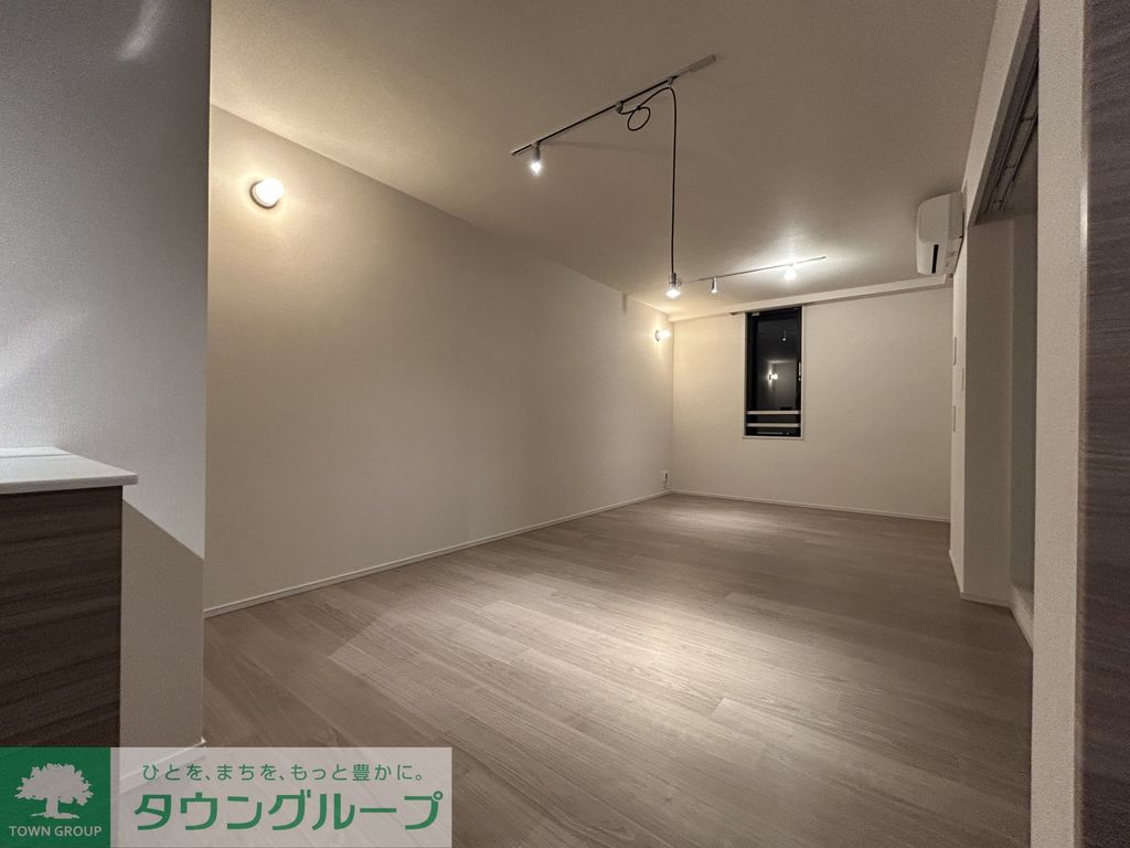 Lumina Court Takaidoの居間写真
