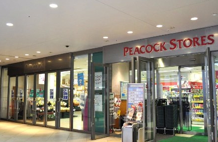 スーパー　ピーコックストアグランパーク田町店（スーパー）まで454m