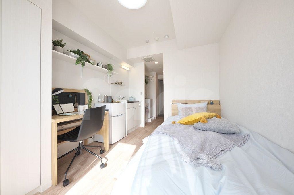 居室・リビング　※モデルルーム写真（居室内ベッド）