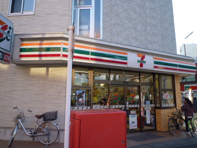 コンビニ　セブンイレブン松戸上本郷駅前店（コンビニ）まで216m