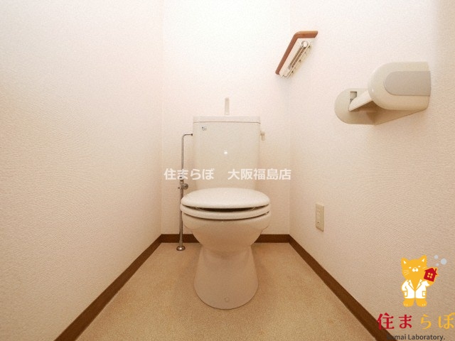 地下鉄御堂筋線 西中島南方駅 徒歩7分 11階建 築30年のトイレ写真
