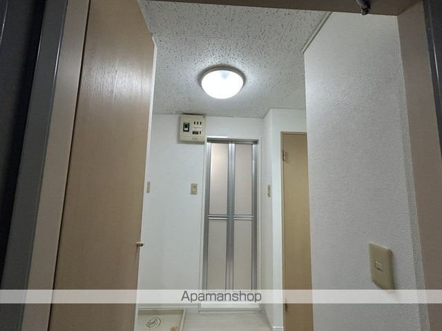 都営三田線 白山駅 徒歩9分 3階建 築29年の玄関写真