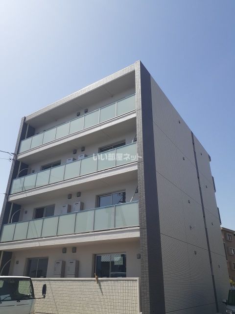 静岡市駿河区丸子新田のマンションの建物外観