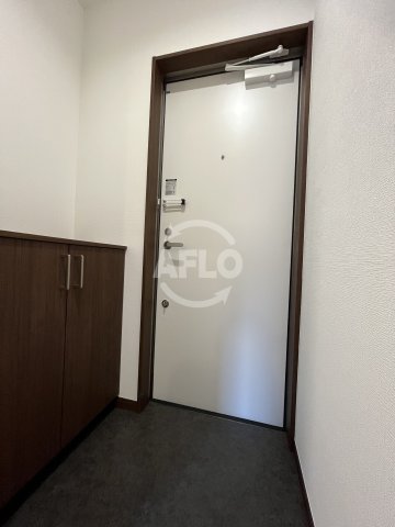 玄関　アールグレイコート桃谷　玄関