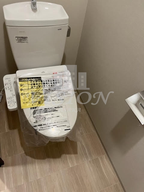 地下鉄御堂筋線 大国町駅 徒歩3分 15階建 築4年のトイレ写真
