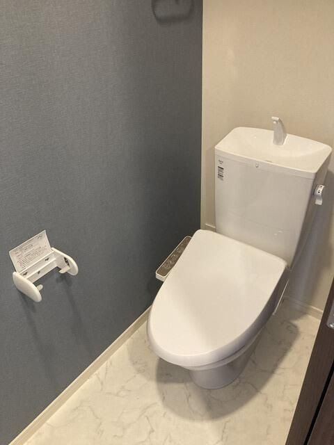 トイレ　■温水洗浄便座