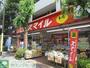 ドラックストア　ドラッグストアスマイル国立店（ドラッグストア）まで240m