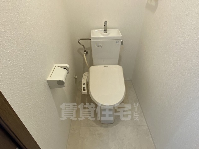 地下鉄鶴舞線 川名駅 徒歩1分 3階建 築25年のトイレ写真