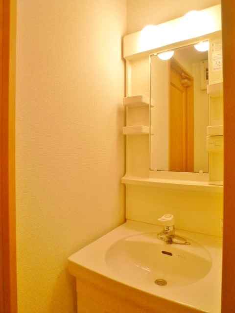 洗面設備　401号室の写真です。