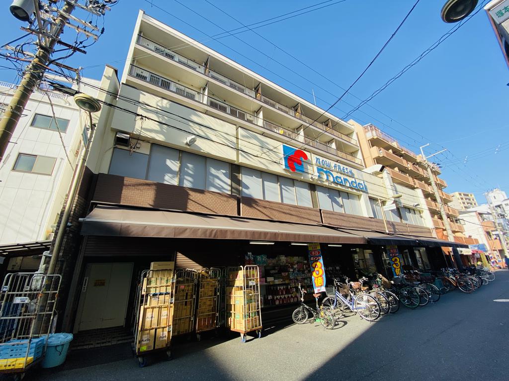 スーパー　万代塚本店（スーパー）まで558m