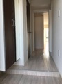 玄関　※参考写真　同建築メーカー施工の同間取完成他物件のものです。
