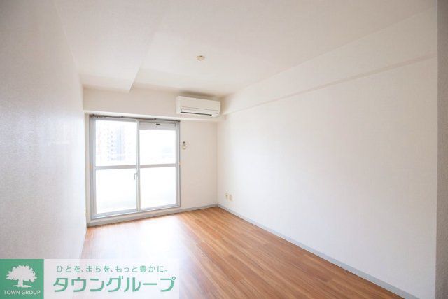 グローリア初穂大島IIの居間写真