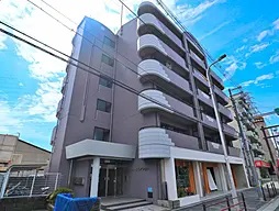 【大阪市平野区長吉出戸のマンションの建物外観】