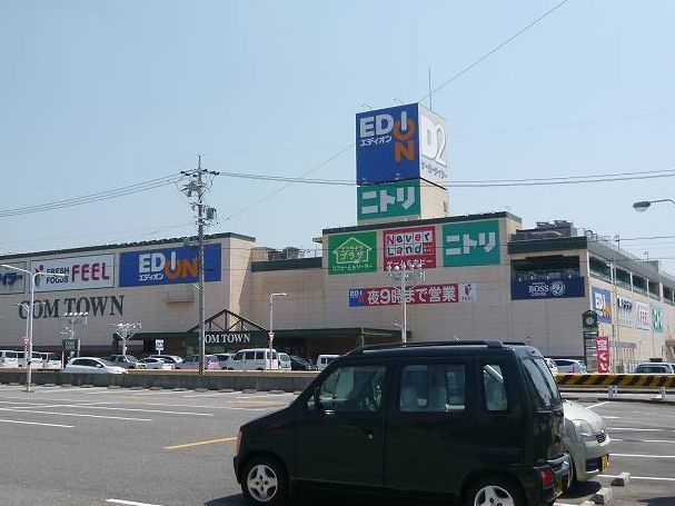 ショッピングセンター　コムタウン（ショッピングセンター）まで750m