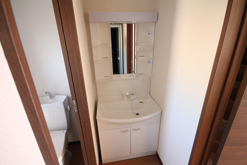 洗面設備　写真は106号室。