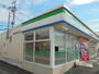 コンビニ　ファミリーマート 日野万願寺店（コンビニ）まで895m