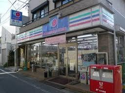 コンビニ　コミュニティストア（コンビニ）まで1042m