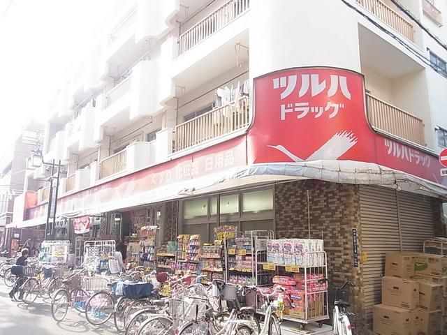 ドラックストア　ツルハドラッグ梅屋敷店（ドラッグストア）まで609m