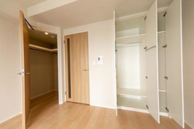 収納　写真は同タイプ住戸です。
