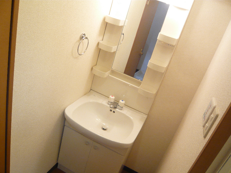 洗面設備　※写真は202号室参照です。