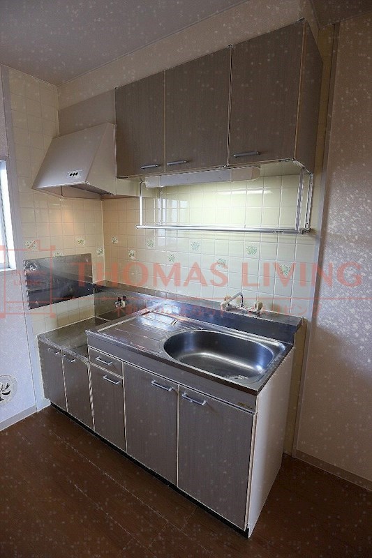 キッチン　写真は別号室のものです。