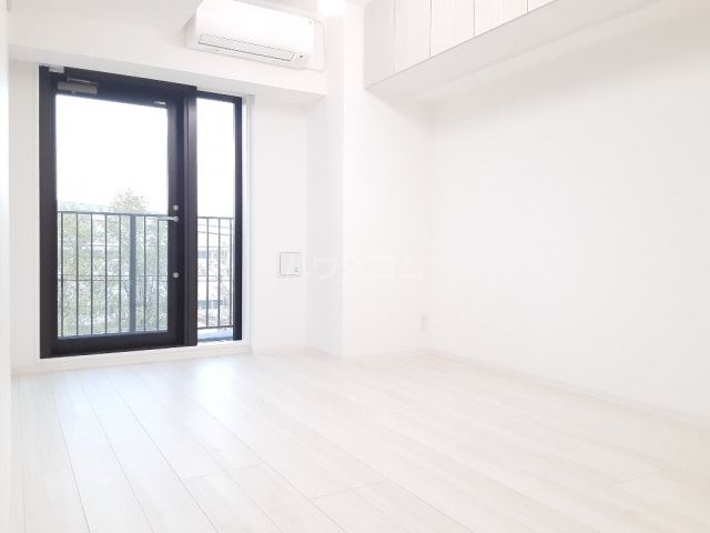 ブライズ北綾瀬の居間写真