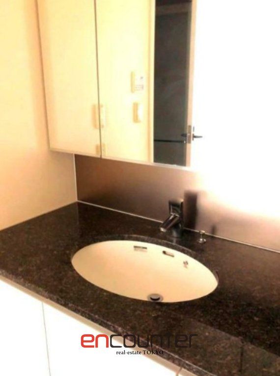 洗面設備　※同マンション別室参考写真