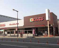 スーパー　デイリーカナートイズミヤ深江橋店（スーパー）まで555m