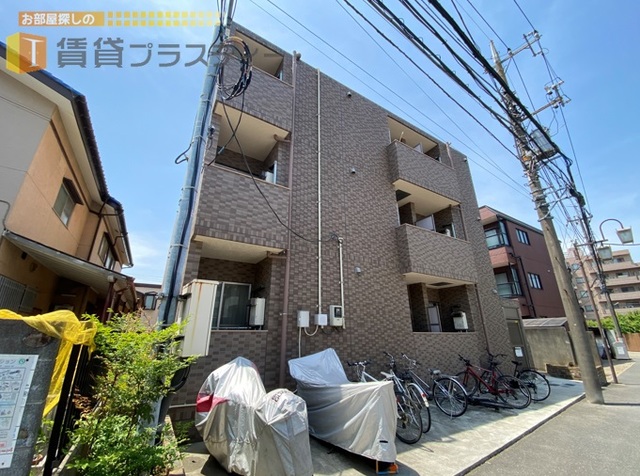 建物外観　大人カラーで、落ち着いたタイル張りの外観。