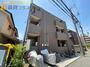 建物外観　大人カラーで、落ち着いたタイル張りの外観。