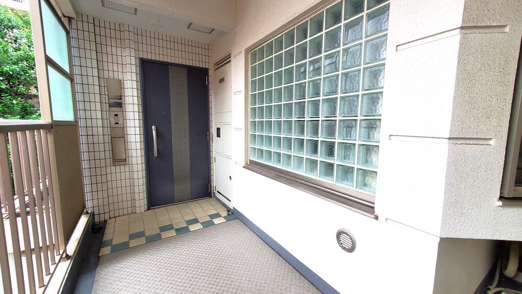 都営三田線 白山駅 徒歩1分 14階建 築23年の玄関写真