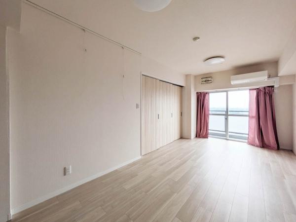 プロムナード仲町台 3号棟の居間写真
