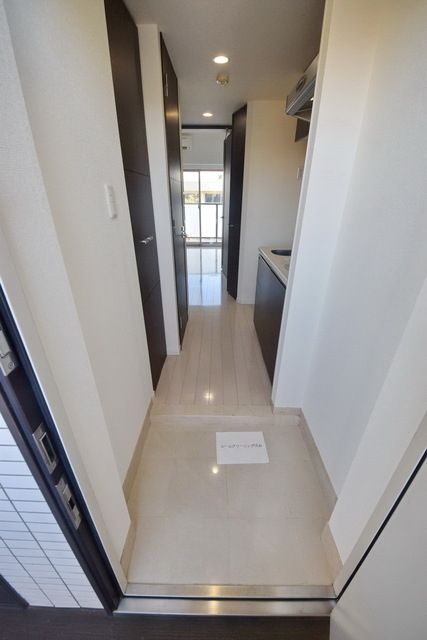 玄関　タウンハウジング府中店まで