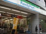 コンビニ　ファミリーマート　稲田堤南口店（コンビニ）まで92m
