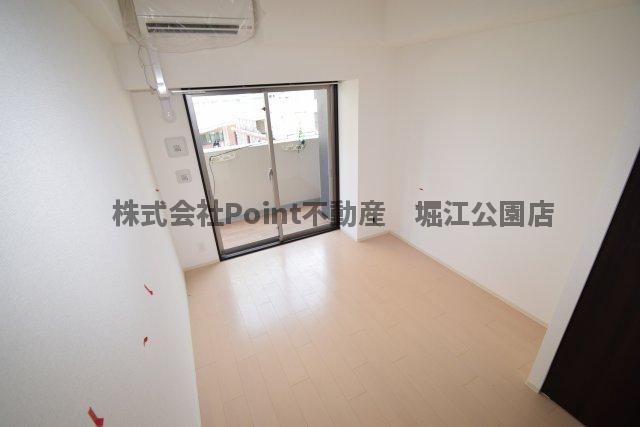 地下鉄長堀鶴見緑地線 西長堀駅 徒歩10分 15階建 築11年の居間写真