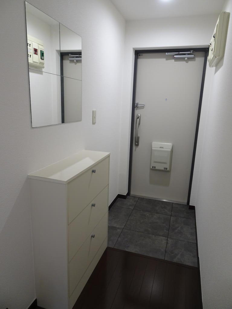 ライオンズステーションプラザ大塚の玄関写真