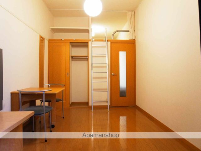 レオパレスサンスーシー白旗の居間写真