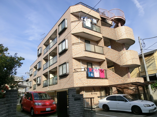 建物外観　日当たり良好のキレイなタイル貼りのマンションです。