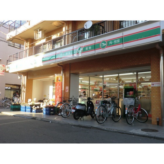 コンビニ　ローソンストア１００（コンビニ）まで65m