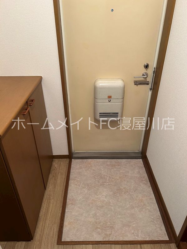 プレジール IIIの玄関写真
