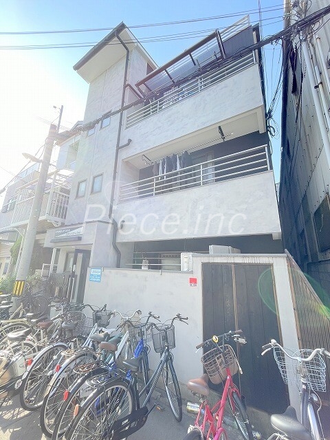 大阪市淀川区三津屋南のマンションの建物外観