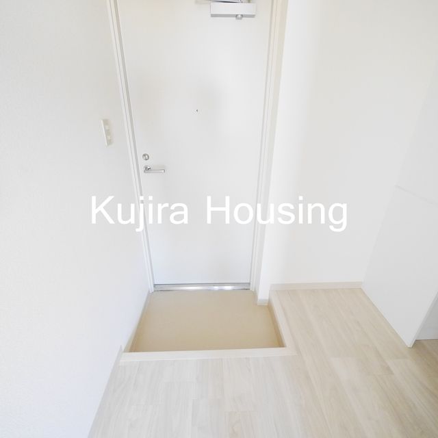 クレモナ千間台西の玄関写真