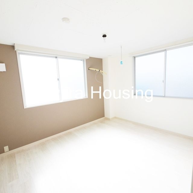 クレモナ千間台西の居間写真