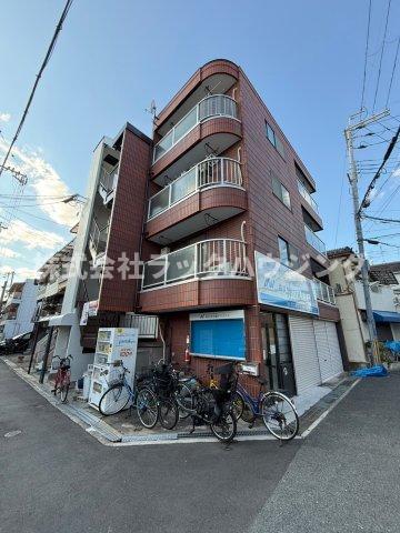 寝屋川市萱島桜園町のマンションの建物外観