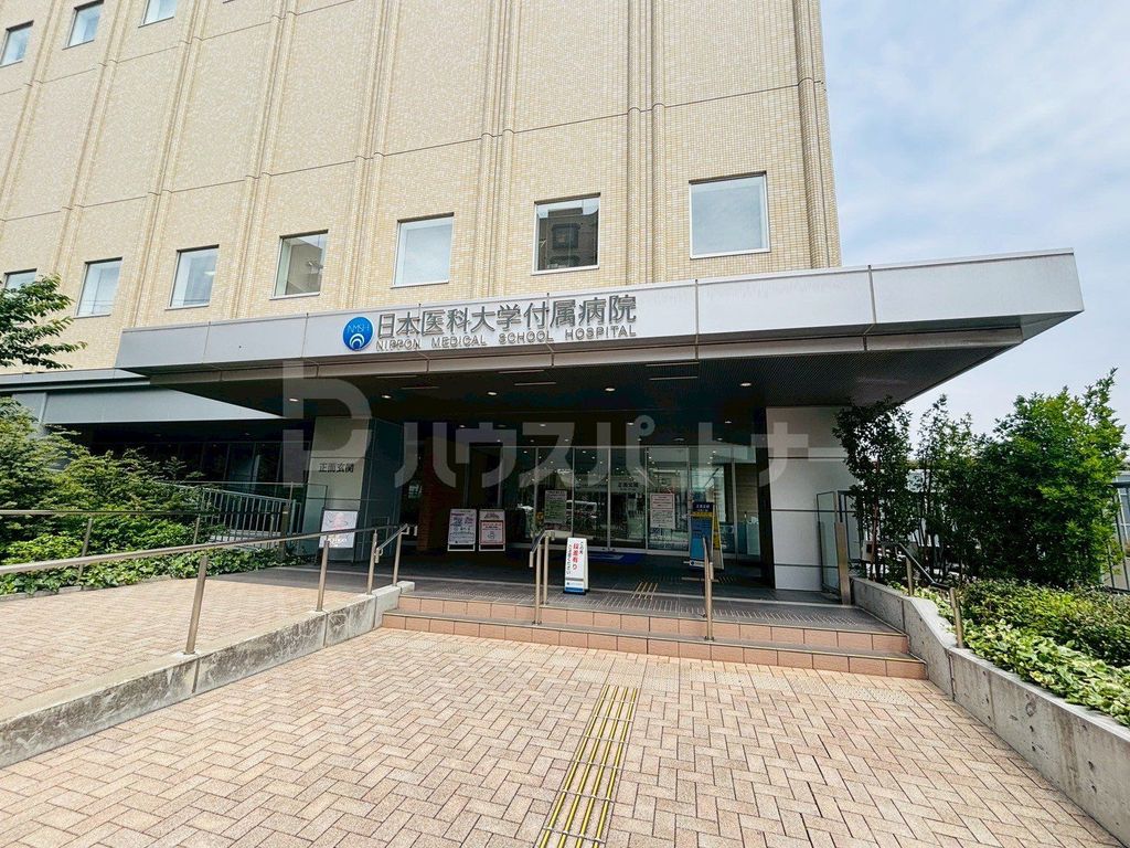 コンビニ　セブンイレブンAIM日本医科大学付属病院店（コンビニ）まで310m