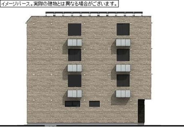 【稲城市東長沼のマンションの建物外観】