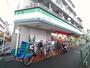 コンビニ　ファミリーマート まるいし八幡山店（コンビニ）まで325m