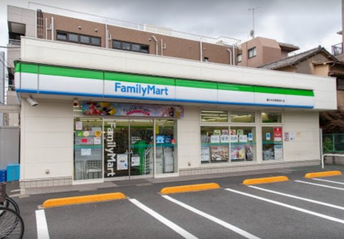 コンビニ　ファミリーマート 鵜の木多摩堤通り店（コンビニ）まで442m