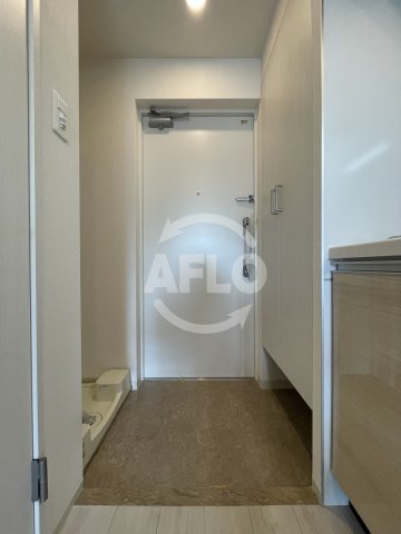 フォーリアライズ福島WESTの玄関写真