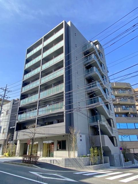 稲城市東長沼のマンションの建物外観